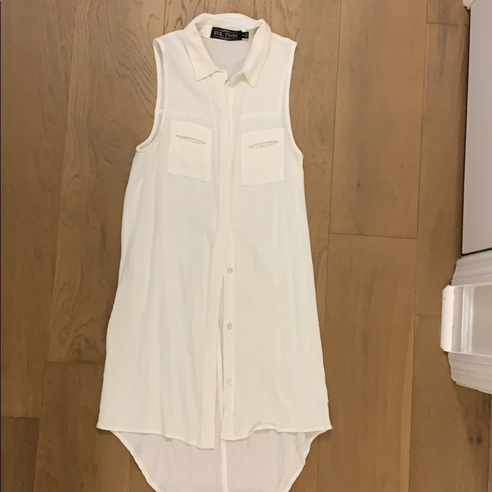 White collared sleeveless button down